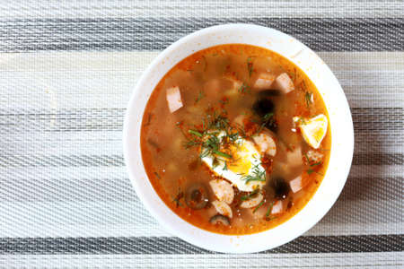 Bowl of russian soup solyanka in restaurantの写真素材