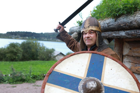 Portrait of aggressive man in viking armorの写真素材