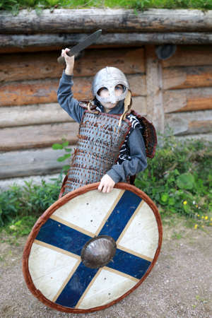 Portrait of boy posing in Viking Armor, Kareliaの写真素材