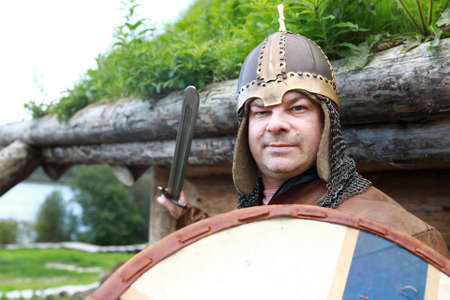 Portrait of serious man in Viking Armor, Kareliaの写真素材