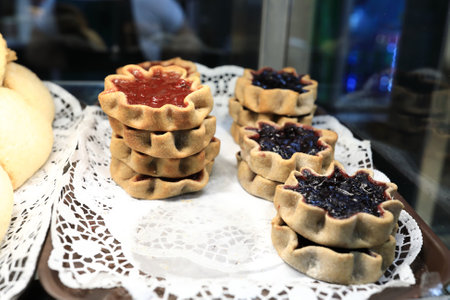 Shortbread cookies with jam on cafe counterの写真素材