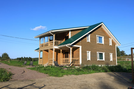 View of cottage in village in summer, Kareliaの写真素材