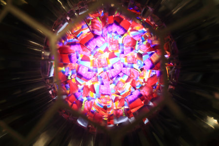 View of glowing colorful kaleidoscope as backgroundの写真素材