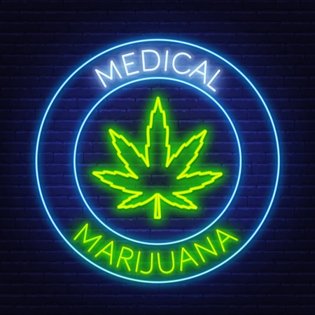 Medical marijuana neon sign on the brick wall background.のイラスト素材