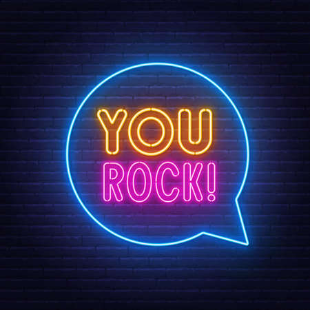 You Rock neon lettering on brick wall background.のイラスト素材