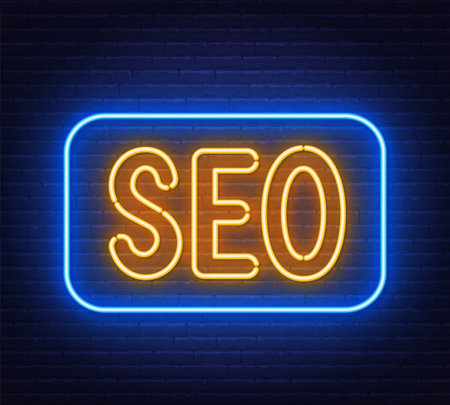 SEO neon sign on brick wall background.のイラスト素材