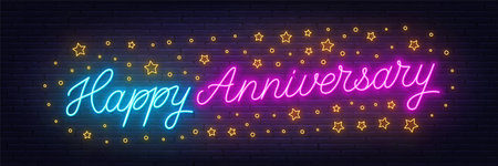 Happy Anniversary neon lettering on brick wall backgroundのイラスト素材