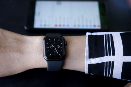 Bali Indonesia June 2, 2020 : female hands using with apple, Apple Watch is a line of smartwatches...