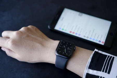 Bali Indonesia June 2, 2020 : female hands using with apple, Apple Watch is a line of smartwatches...