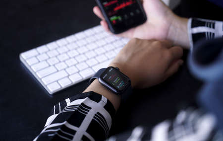 Bali Indonesia June 2 , 2020 : Apple Watch Series 5 Ready to work out on woman's hand. Woman using smart watchのeditorial素材
