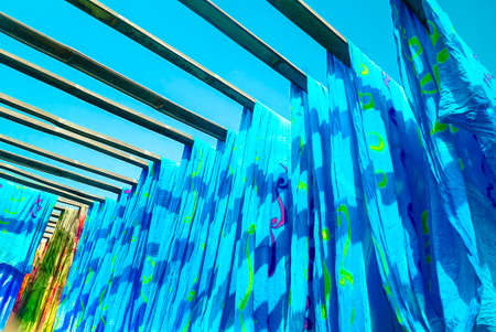 Sukoharjo Indonesia June 20 2020 : Colorful Batik hanging to dry after drawing batik  processのeditorial素材