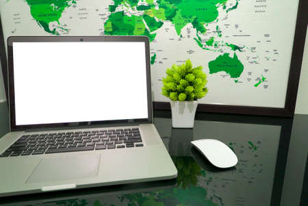 Isolated Macbook pro with white screen layer and workspace concept, work from home