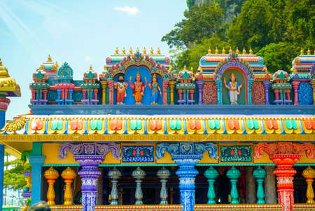 Batu Caves with the world's tallest Murugan statue, where is a limestone hill that has a series of caves and cave temples, in Selangor.のeditorial素材