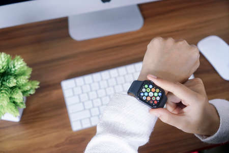 Bali Indonesia June 12, 2020 : female hands using with apple, Apple Watch is a line of smartwatches...