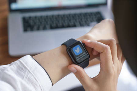 Bali Indonesia June 12, 2020 : female hands using with apple, Apple Watch is a line of smartwatches designed, developed, and marketed by Apple Inc.のeditorial素材