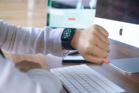 Bali Indonesia June 12, 2020 : female hands using with apple, Apple Watch is a line of smartwatches designed, developed, and marketed by Apple Inc.のeditorial素材
