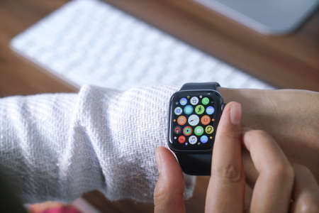 Bali Indonesia June 12, 2020 : female hands using with apple, Apple Watch is a line of smartwatches...