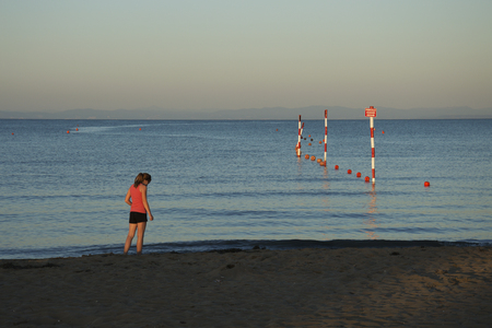 A girl near the seaの写真素材