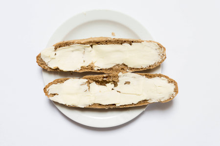 Roll bread with butter for breakfastの写真素材