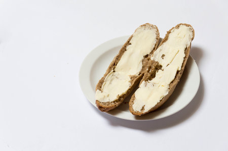 Roll bread with butter for breakfastの写真素材
