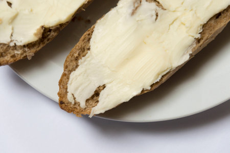 Roll bread with butter for breakfastの写真素材