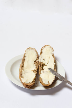 Roll bread with butter for breakfastの写真素材
