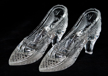 The pair crystal shoes in the black backroundの写真素材