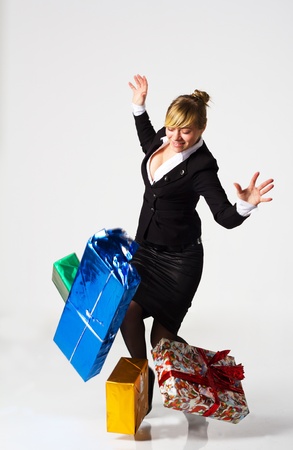 business woman drops her purchases near the officeの写真素材