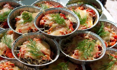 salad of mushrooms with cheese, pepper, greens outdoor on holiday of harvestの写真素材