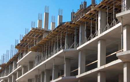 construction of a multistory building on sunny summer day