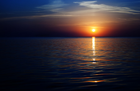 bright colorful sunset on the sea on summerの写真素材