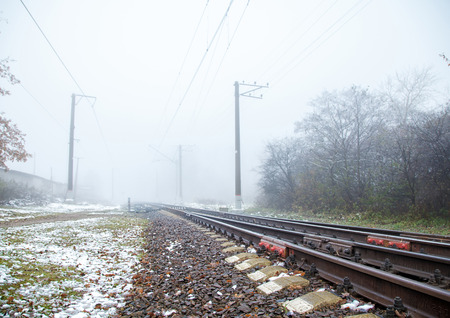 raiway on foggy day in late autumn