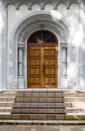 beautiful retro front door. outside view. sunny summer dayの写真素材