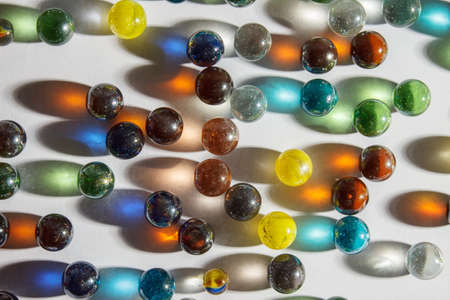 multicolored glass balls on the table indoor closeup