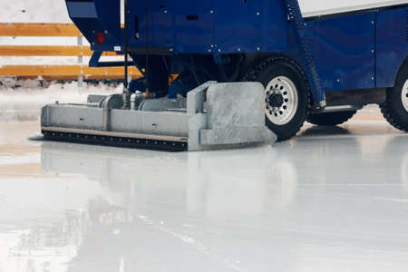 special machine leveled ice rink on sunny winter dayの写真素材