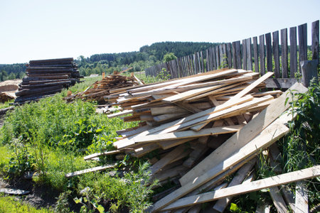 sawn boards at sawmill outdoor on summer day