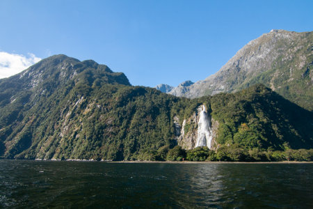 Bowen Falls between Cascade Peak and Barren Peak, Milford Sound, Fiordland National Park, New Zealand waterfallの写真素材