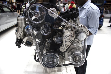 Dubai, UAE - NOVEMBER-14-2011: car engine chrome side view on display at the Dubai Motor Show, UAE.
