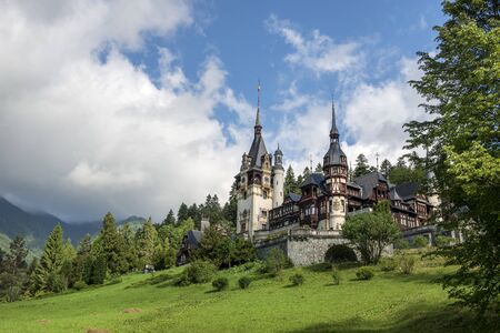 pelesh castle with fog in the mountainsのeditorial素材