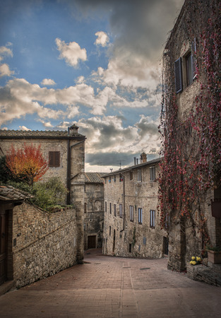 beautiful old street with flowers, verticalの写真素材