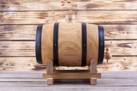 Wooden barrel on a wooden backgroundの写真素材
