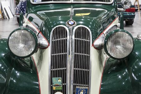 Old car on display at the International Fair in Poznan. BMW, is a German luxury vehicle, motorcycle, and engine manufacturing company founded in 1916.のeditorial素材
