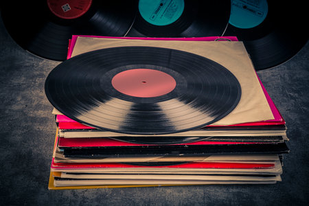 Vintage vinyl records on grunge background. selective focus.の写真素材