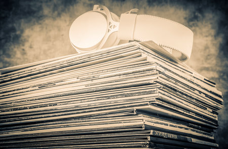 Pile of magazines with hard cover and glasses on grunge backgroundの写真素材