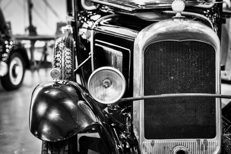 Vintage car in the exhibition hall. Black and white photo.の写真素材