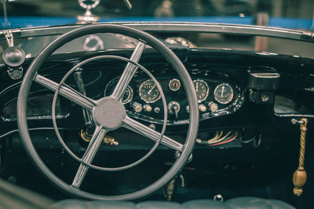 Vintage Steering wheel of a classic car. Selective focus.