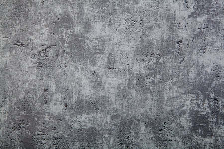Texture of old rustic wall covered with gray stucco. Abstract background for design.