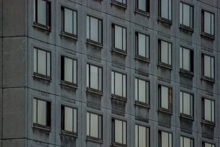 Old concrete prefabricated buildingの写真素材