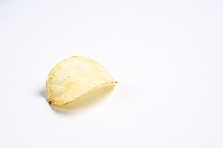 Simple potato chips on white backgroundの写真素材