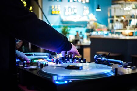 DJ vinyl players in dark nightclub, party in the dance clubの写真素材